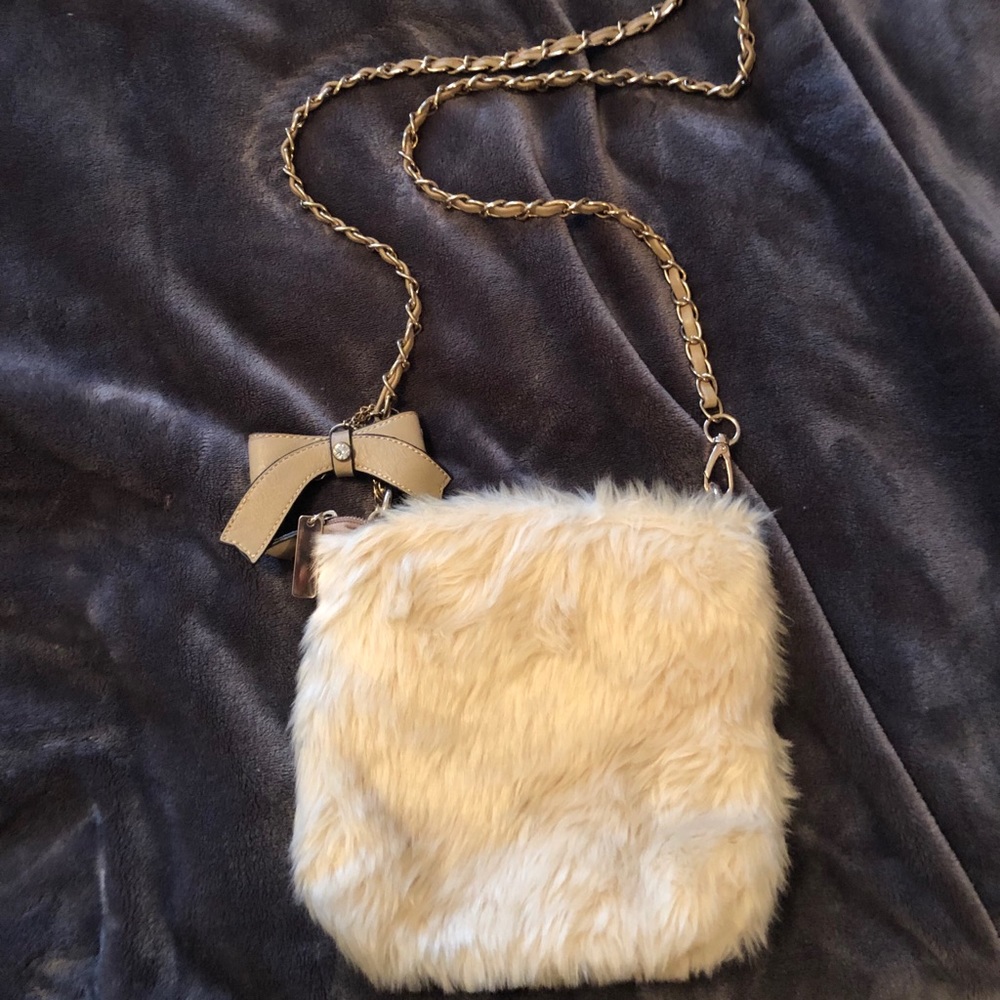 White furry purse